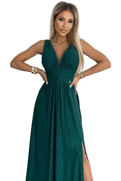 Long brocade dress with neckline and stitching at the waist Numoco