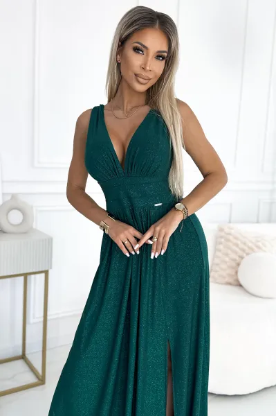 Long brocade dress with neckline and stitching at the waist Numoco