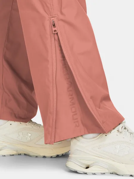 Ružové športové nohavice Under Armour UA Rush OS Woven Pant