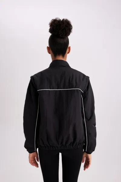 DEFACTO Fit Water Repellent Stand Collar Detachable Sleeve Detailed Pocket Lined Light Thin Coat