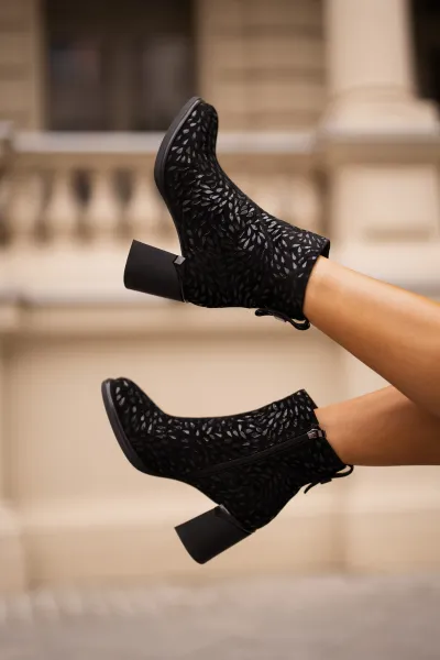 Suede ankle boots on a heel with decorative embossing D&A black