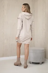 Dress with decorative ruffles and beige hood