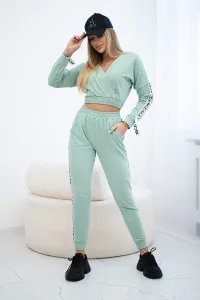 Set with decorative stripes dark mint