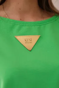 Cotton blouse with ruffles on the shoulders in light green color