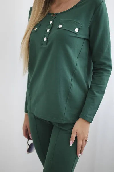 Set with a green press stud neckline