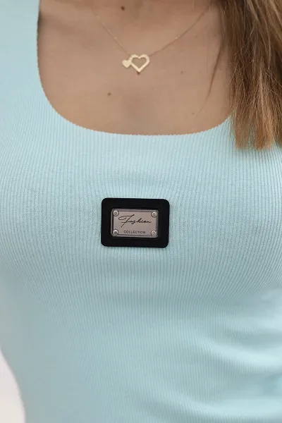 Striped blouse with a metal plate of mint