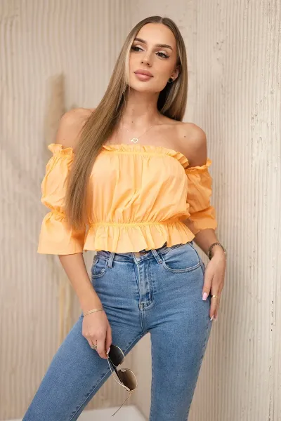 Peach blouse without shoulders