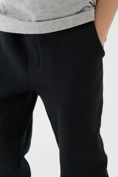 Chlapčenské zateplené tepláky 4F JUNIOR TROUSERS-JWAW24TTROM760-20S-DEEP BLACK