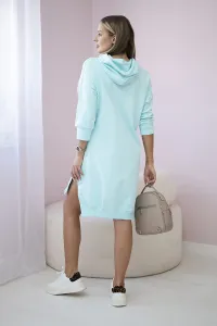 Dress with a hood and a longer back mint
