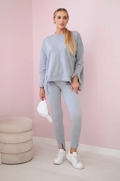 Complete with an oversized blouse in gray color