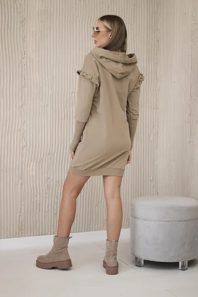 Dress with decorative ruffles and camel hood