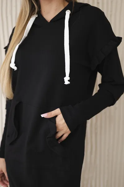 Black dress with decorative ruffles and hood