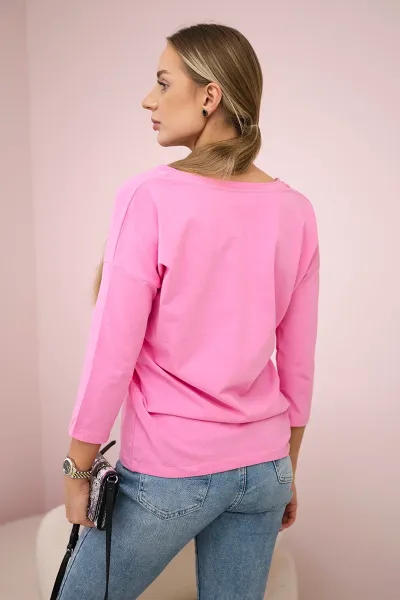 Light pink blouse with a V-neck