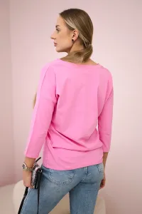 Light pink blouse with a V-neck