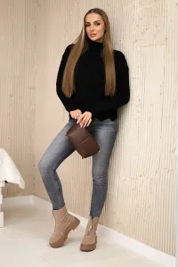Black sweater with decorative ruffle