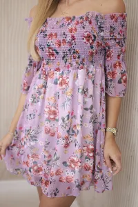 Shoulder dress with a floral pattern in purple color