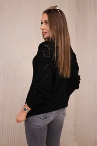 Black high-neckline sweater with diamond pattern