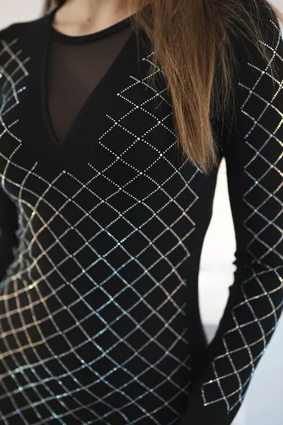Knitted dress with a decorative pattern in black cubic zirconia