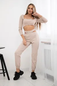 Complete with a beige blouse top