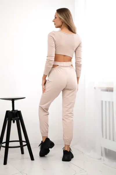 Complete with a beige blouse top