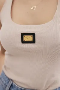 Striped tank top with beige metal plate