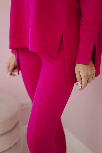 Complete with an oversized blouse in fuchsia color