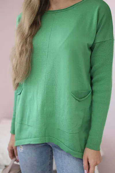 Sweater with front pockets in light green color