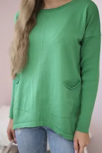 Sweater with front pockets in light green color