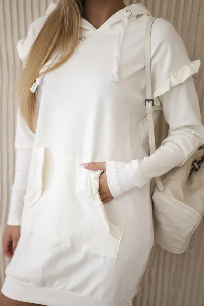 Dress with decorative ruffles and hood in ecru