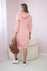 Dress with a hood and a longer back part apricot