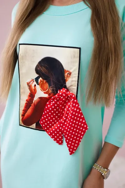 Dress with graphics and bow in polka dot 3D mint