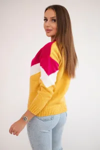 Sweater with geometric fuchsia + mustard patterns