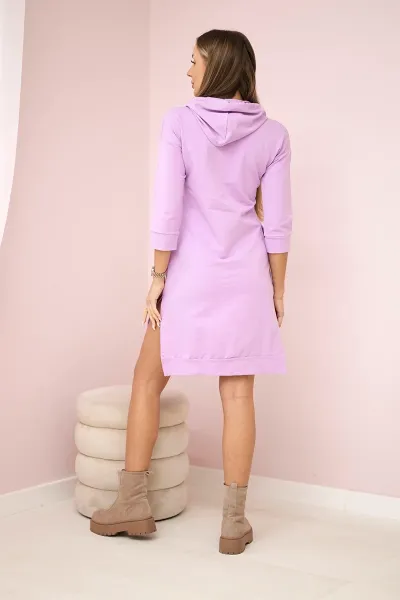 Dress with a longer back and a colorful purple print