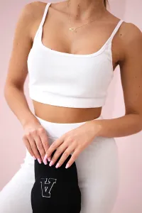 Striped top with a white blouse