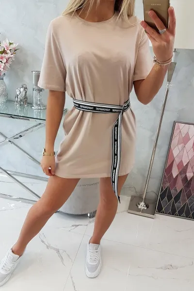 Dress with decorative belt in beige color