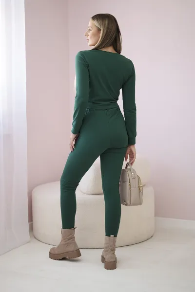 Set with ruffles on a green blouse