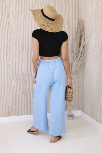Blue trousers with a wide waist