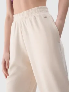 Dámske tepláky 4F TROUSERS CAS F1010-83S-BEIGE