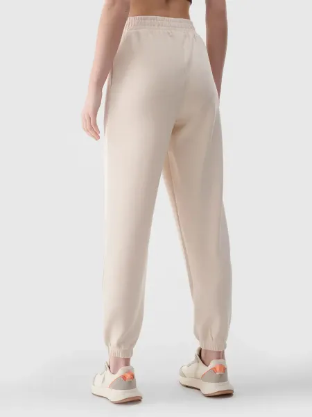 Dámske tepláky 4F TROUSERS CAS F1010-83S-BEIGE