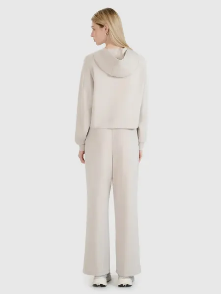 Dámske tepláky 4F TROUSERS CAS F1011-83S-BEIGE