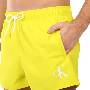 Pánske plavky Calvin Klein žlté (KM0KM01099-LRF) M