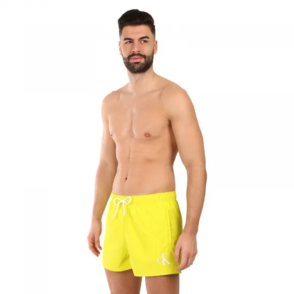 Pánske plavky Calvin Klein žlté (KM0KM01099-LRF) M