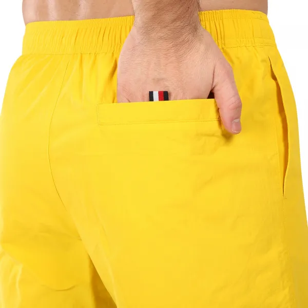 Pánske plavky Tommy Hilfiger žlté (UM0UM03483 ZGY) M