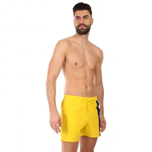 Pánske plavky Tommy Hilfiger žlté (UM0UM03483 ZGY) M