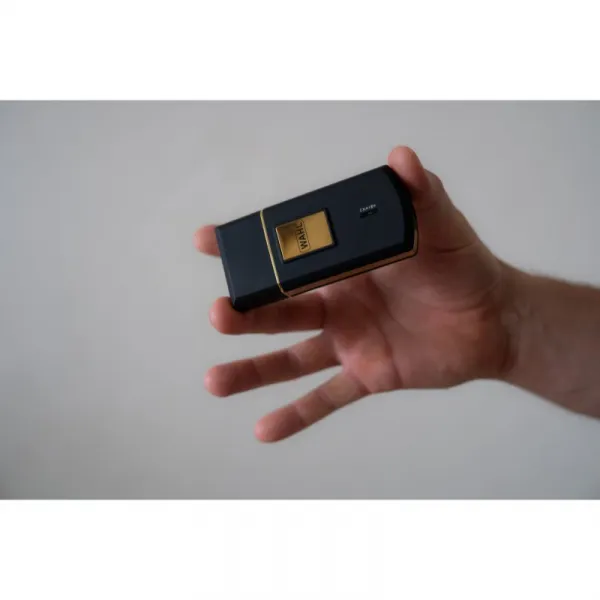 Cestovný holiaci strojček Wahl 7057-016 TravelShaver Gold