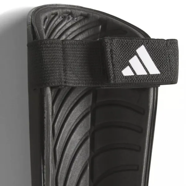 Futbalový chránič ADIDAS TIRO SG TRN BLACK GOLDMT WHITE