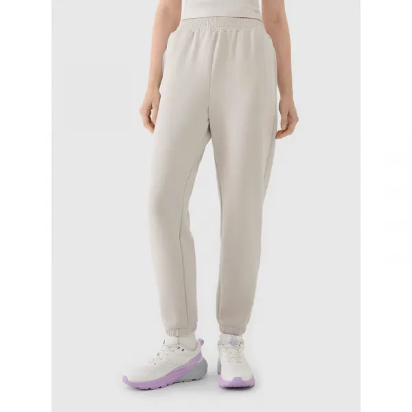 Dámske tepláky 4F TROUSERS CAS F1010-83S-BEIGE