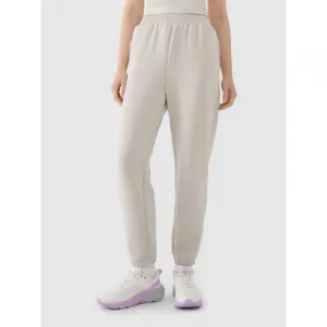 Dámske tepláky 4F TROUSERS CAS F1010-83S-BEIGE