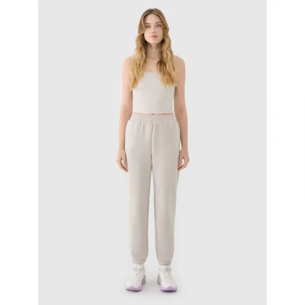 Dámske tepláky 4F TROUSERS CAS F1010-83S-BEIGE