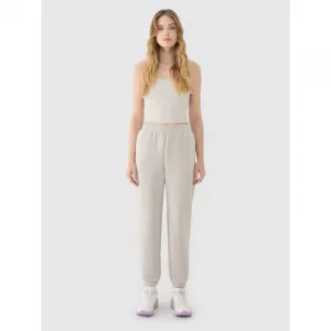 Dámske tepláky 4F TROUSERS CAS F1010-83S-BEIGE